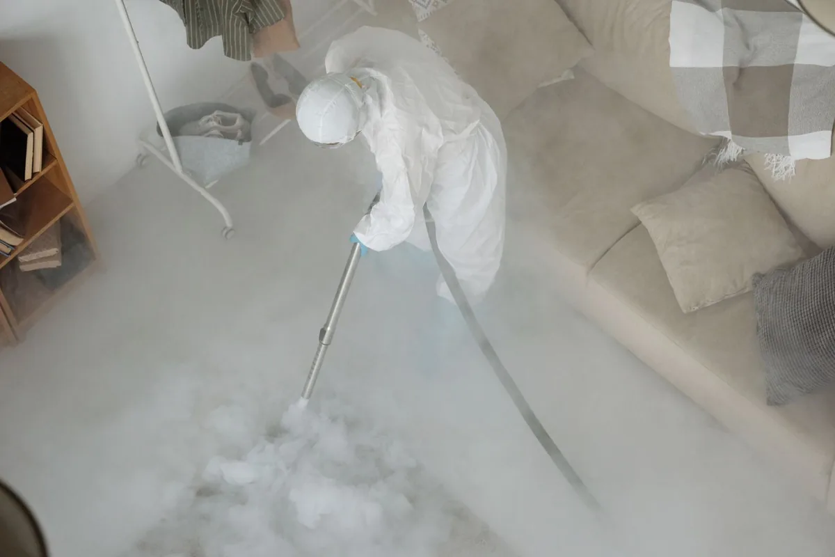Biohazard cleanup technician in protective equipment, Highpoint, OH